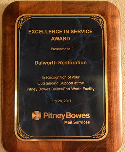 Pitney Bowes Gives an Excellence Service Award to Dalworth Restoration