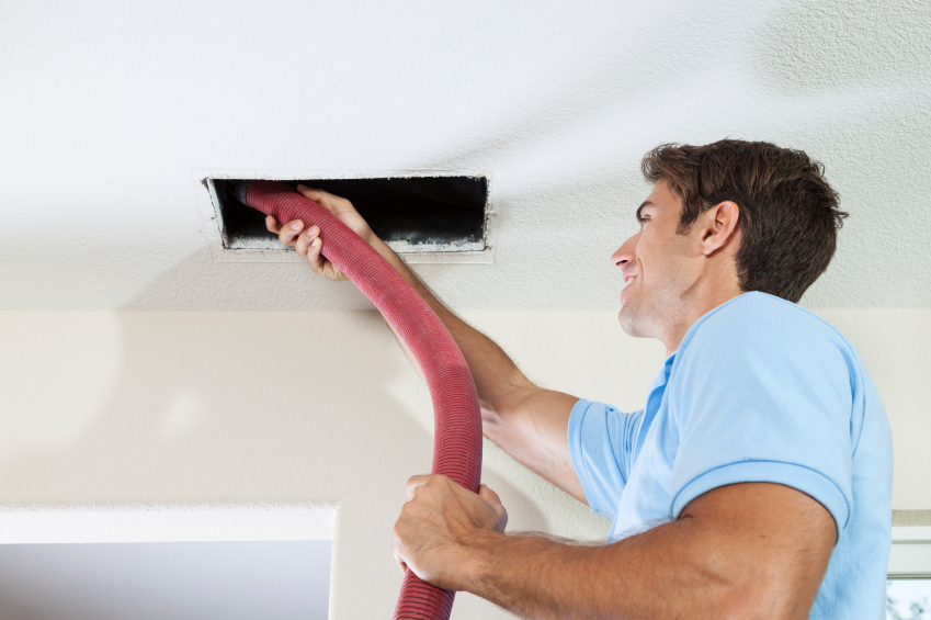 service-tech-cleaning-residential-ductwork