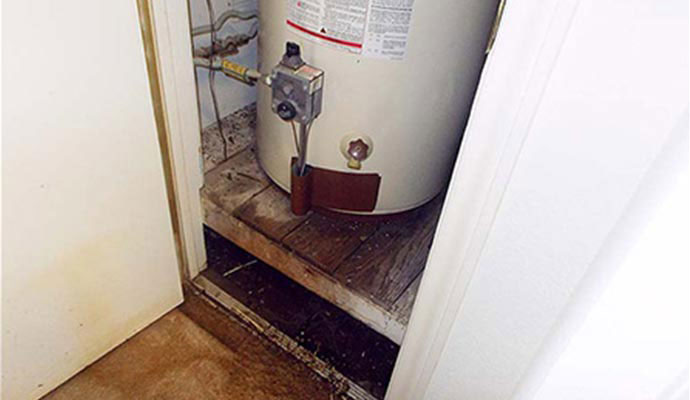 Call Dalworth Restoration For Any Water Heater Overflow Damage in Dallas-Fort Worth Area