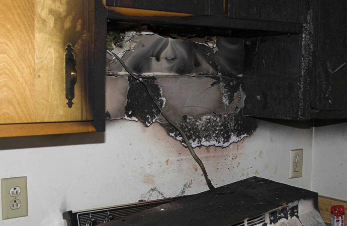 burn wall cabinet kitchen fire damage house