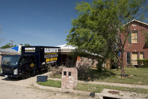 Exterior of home damaged by a tornado