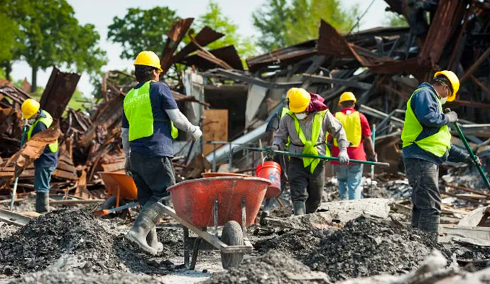 Dalworth Restoration crew clearing debris at a commercial disaster site
