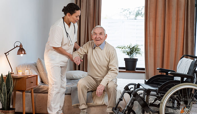 Doctor is Helping Senior Patient