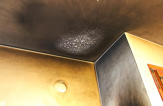 Fire damage soot on ceiling