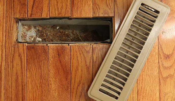 Duct system filled with dirt and debris