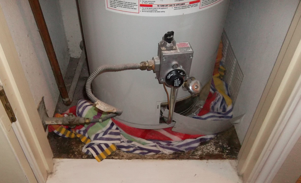 Water heater overflow leaking water throughout home