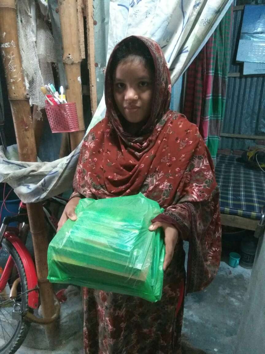 nasrin holding the new books