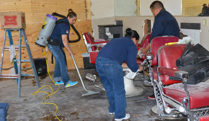 Professional team cleaning a commercial salon