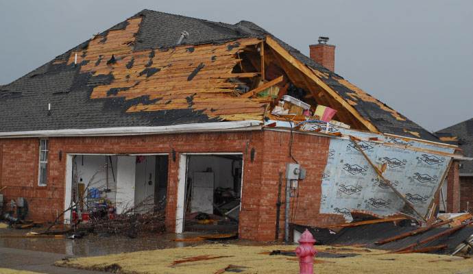 Residential home damaged by tornado