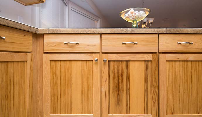 Restored wood kitchen cabinetry