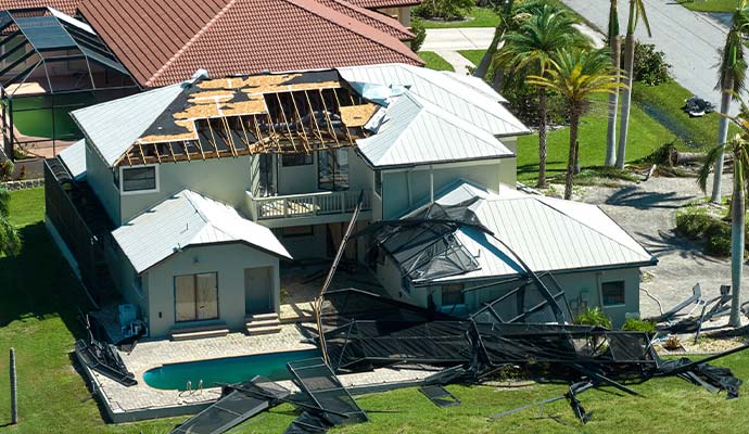 Roof and pool cage damage after tropical storm