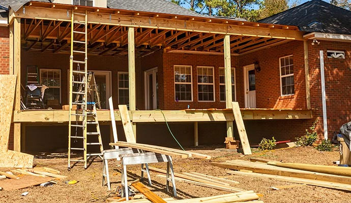 Covered porch construction brick home