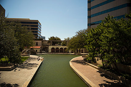 The Mandalay Canal is a waterfront area featuring European aesthetics, walkways, shops, restaurants, paddle boating, as well as Gondola Adventures cruising the beautiful Irving, TX canal.