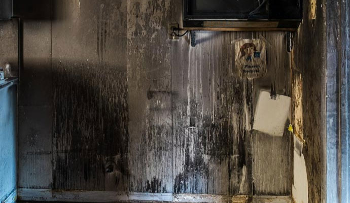 Kitchen wall smoke soot damage