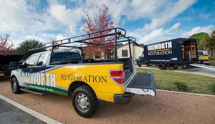 Dalworth Restoration service vehicles on the road