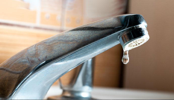 Water leaking from a sink faucet